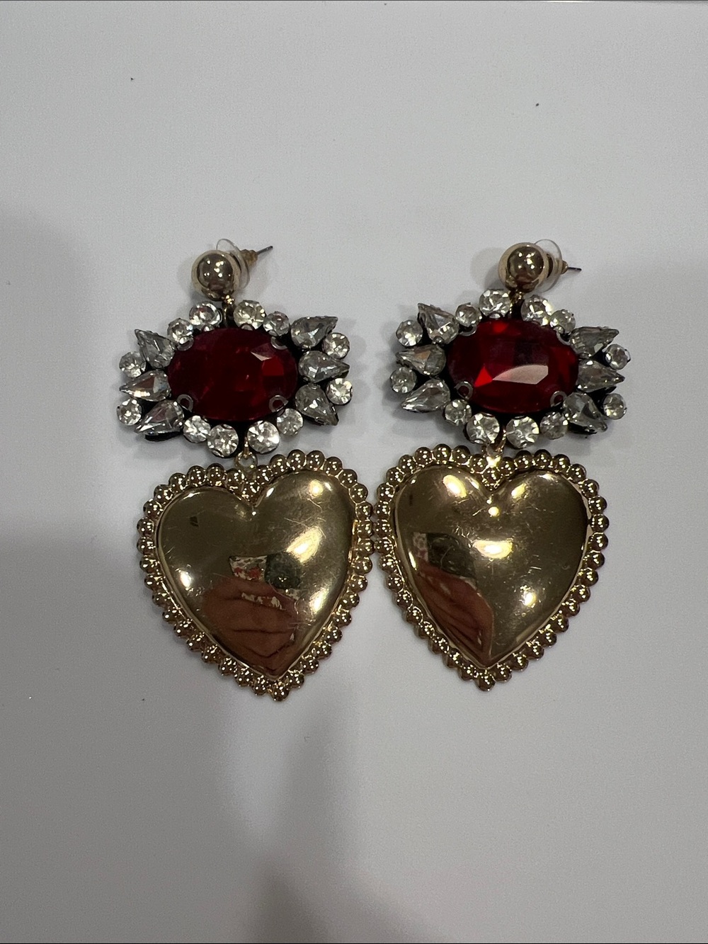 Gold Heart Drop Earrings with Red Crystal Accents